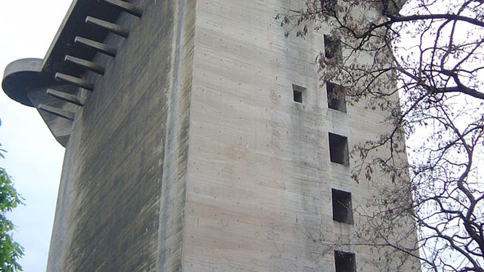 world war two - What is the purpose of the iron structures seen on the  sides of many WW2 flak towers? - History Stack Exchange, image size:1600x900